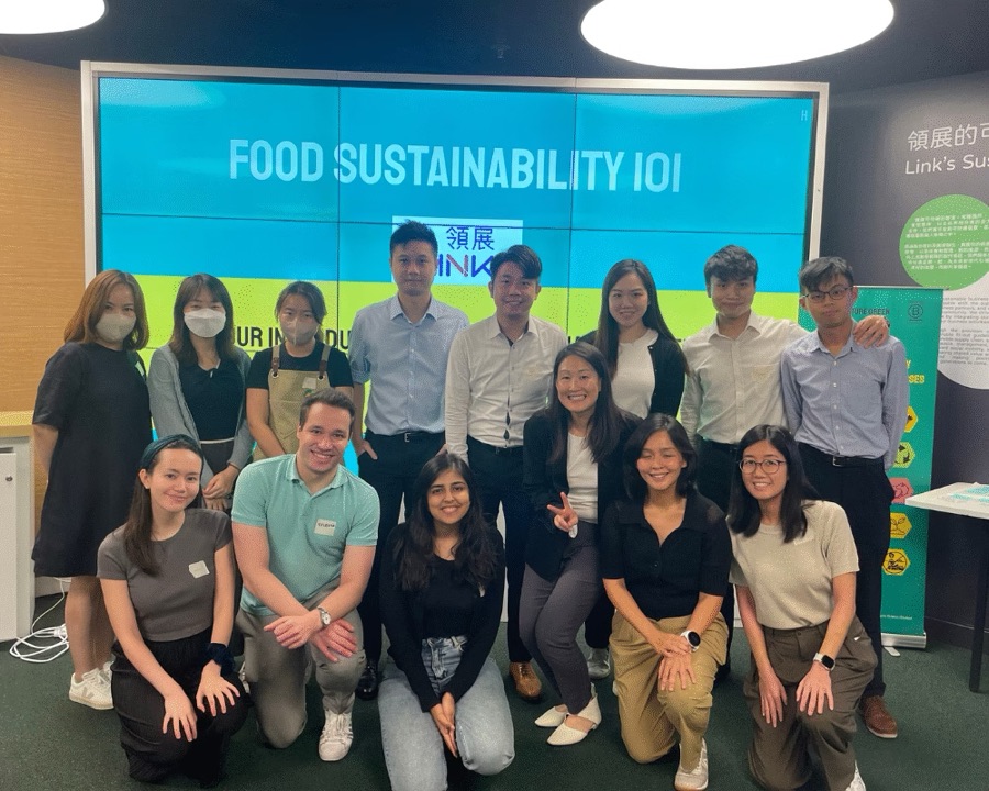 A Future Green corporate training session in Hong Kong, the team gathered under a Food Sustainability 101 screen